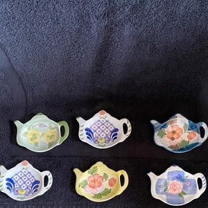 Vintage tea bag holders in the shape of a teapot w/ beautiful floral patterns